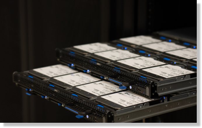 Crunchbits.com large storage servers with their HDD trays out